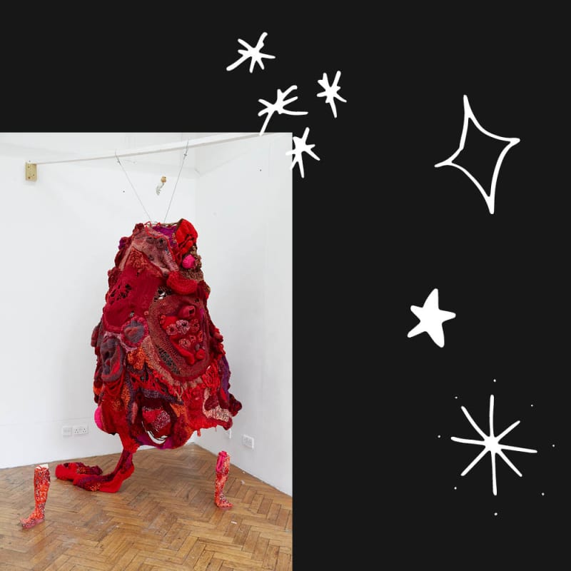 a photograph of a sculpture made of red fabric suspending in a gallery space, on a black background with illustrated stars surrounding the image