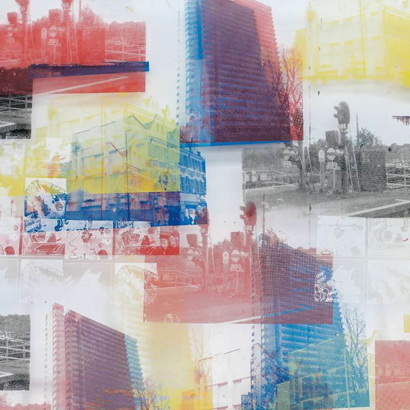 Screenprint of buildings in red, yellow, blue and black.
