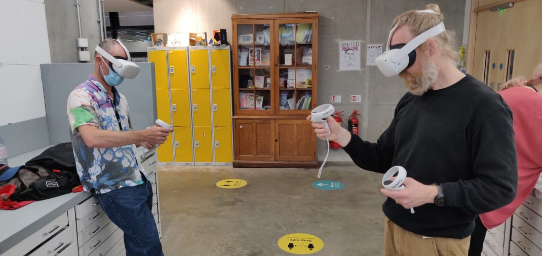 People using virtual reality head sets