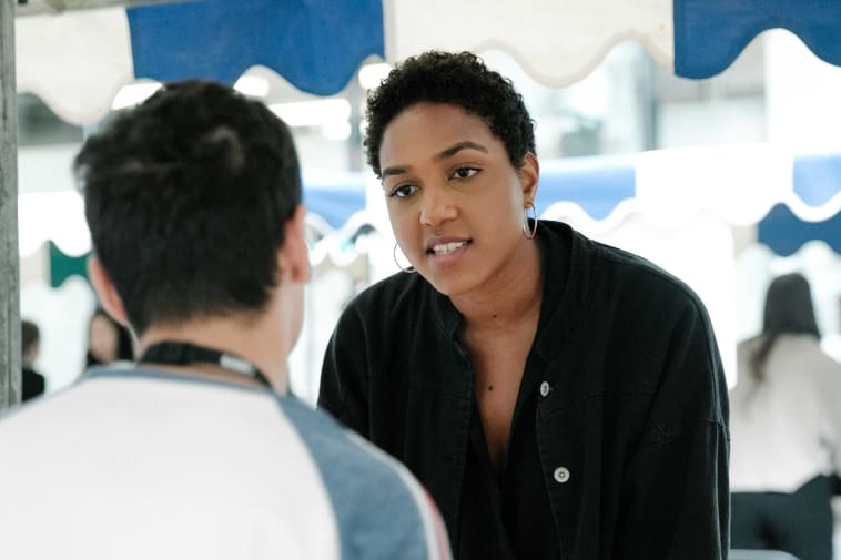 Two people talking at the part time job fair