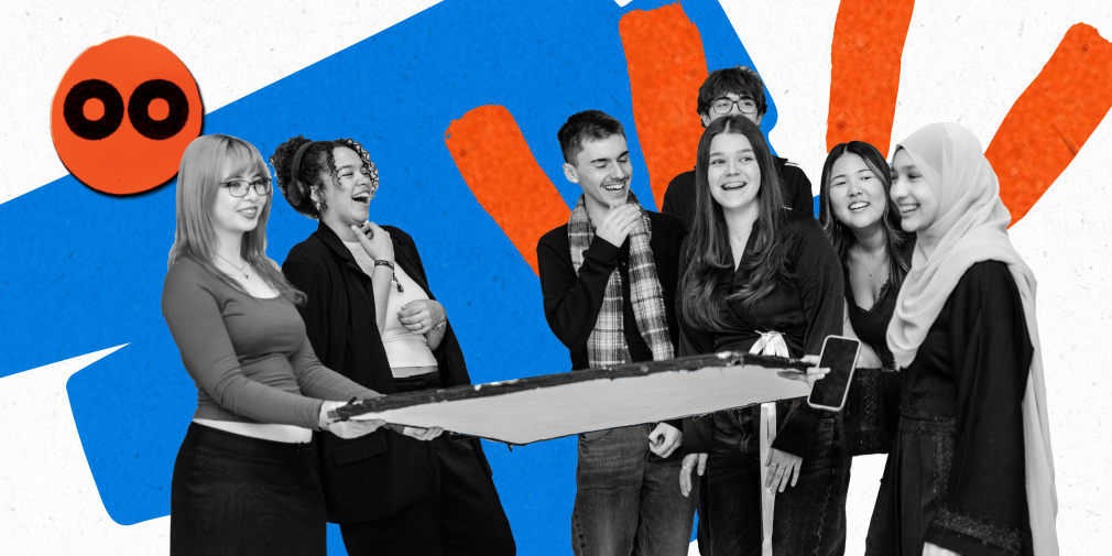 A cut out of group of students, they are smiling and holding something in their hands together