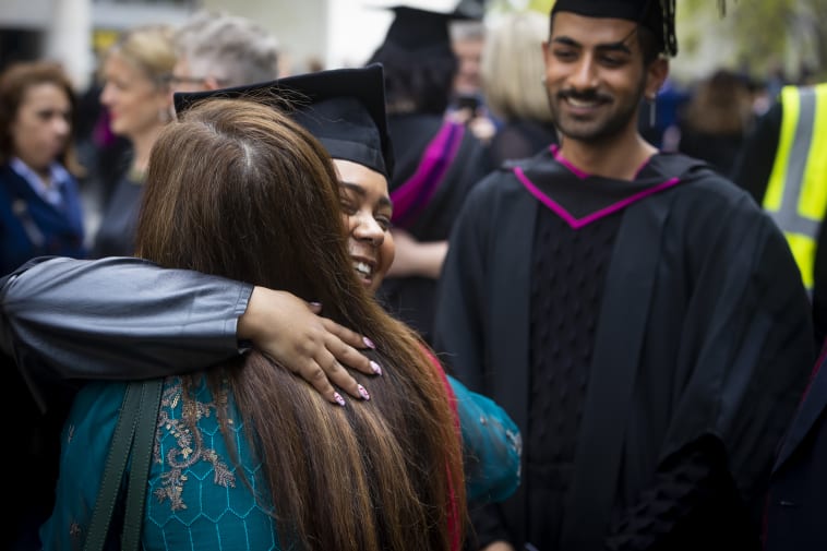 graduates at UAL graduation ceremony