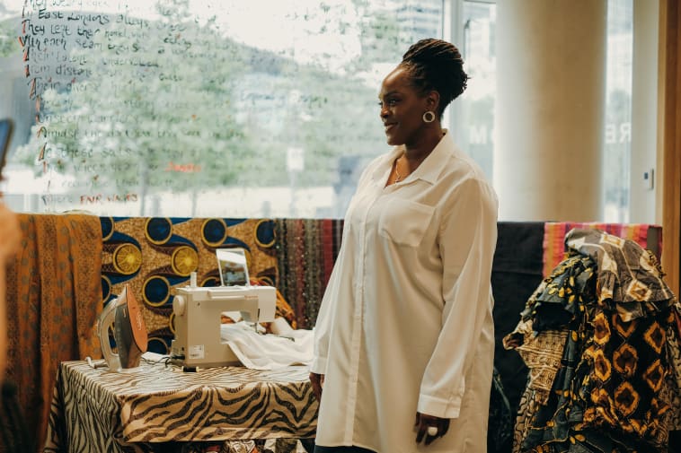 Toyin Gbomedo in front of her installation.