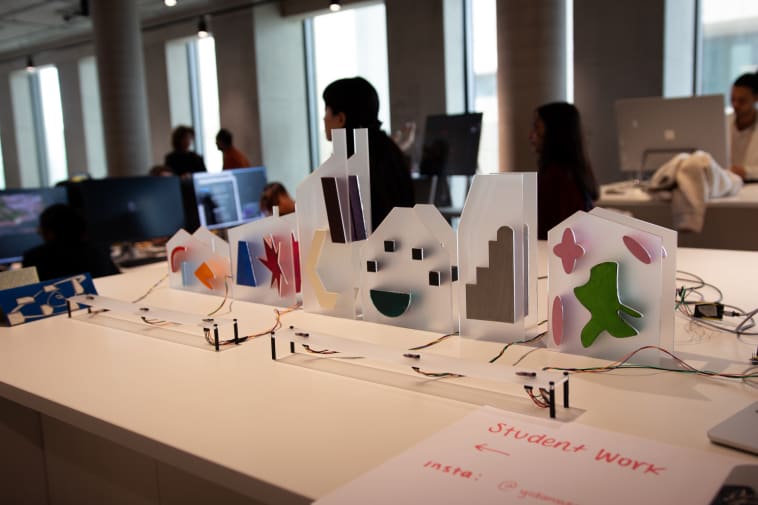 Digital items on a desk at London Tech Week event at East Bank.