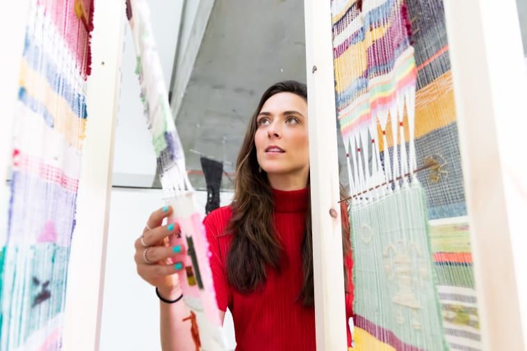 Sara Kelly and her textile installation