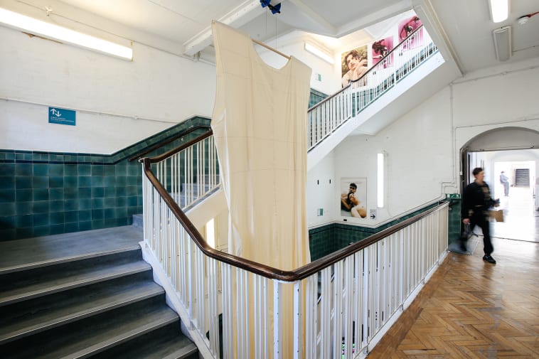 Students walking up stairs at Lime Grove site