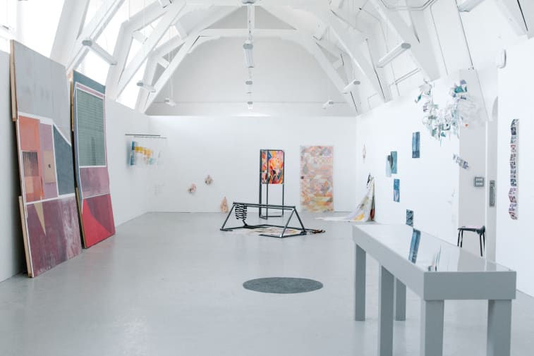 Studio workroom with various artworks