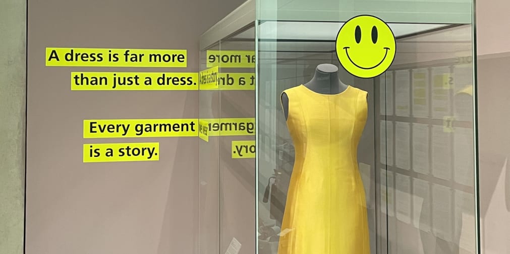 Dress by Balenciaga alongside text by performance artist Cheddar Gorgeous in a section of the exhibition examining fashion, dress and positive well-being.
