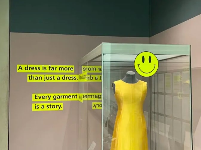 Dress by Balenciaga alongside text by performance artist Cheddar Gorgeous in a section of the exhibition examining fashion, dress and positive well-being.