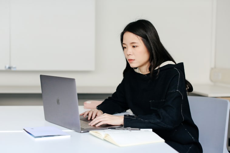 woman working at a laptop