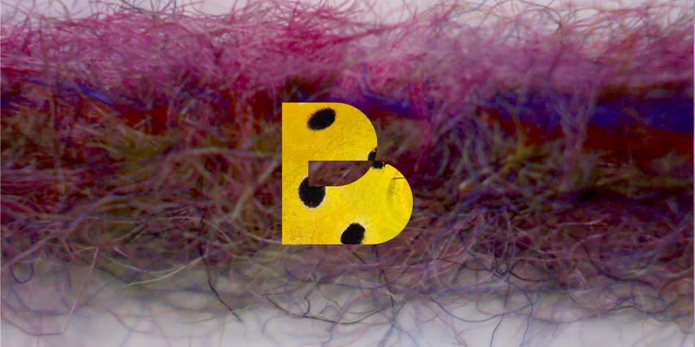 Close up image of textiles with a logo over the top