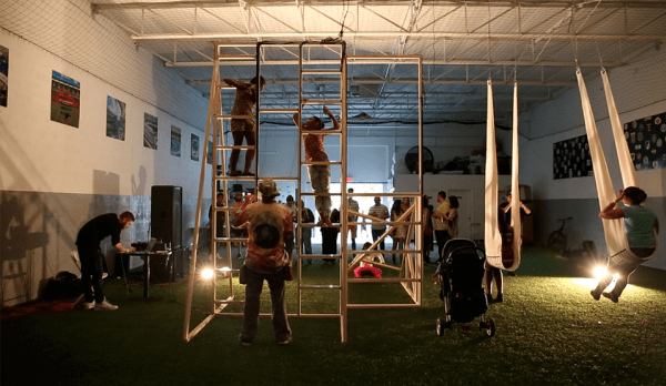 Polyphonic-Playground_-Exhibition-Overview-People-on-swings_-Assemble-Miami_-Photograph-by-Chris-Delgado.png