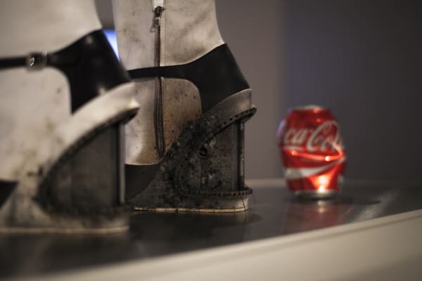 Laboratory-12-exhibition_Photograph-Exhibition-installation-The-Kompromat-boots.jpg