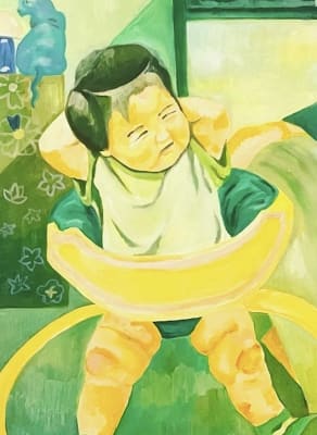 A reading man and relaxing baby