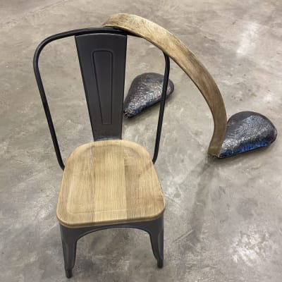 Yoked: performative sculpture with steel, wood and water