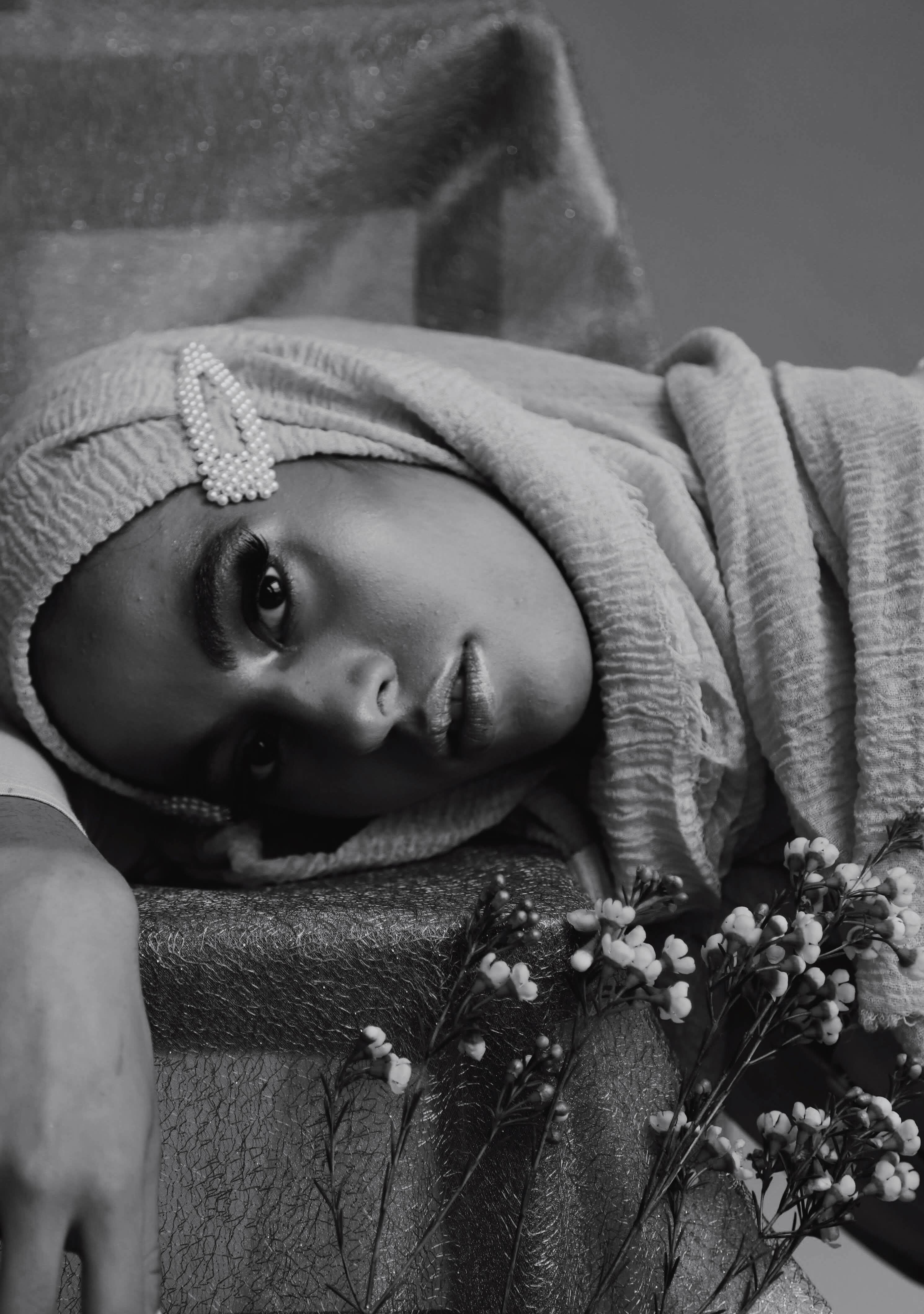 Person with head resting on table