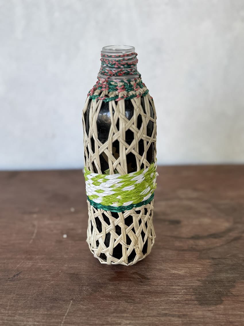 Vase with a woven jipi japa covering