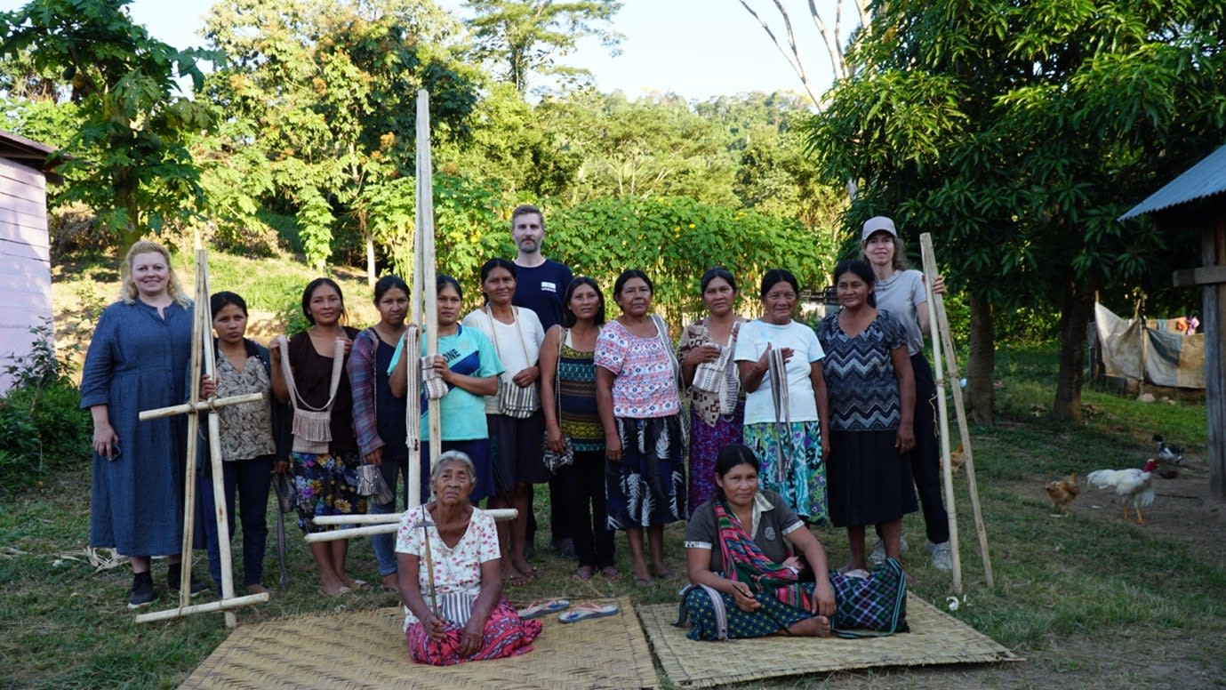 A group of people smiling for the camera