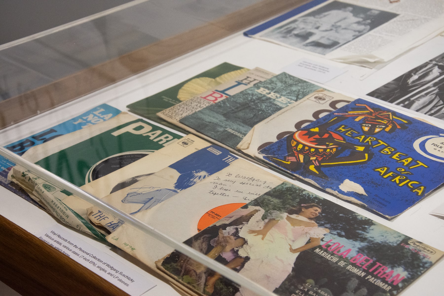 A display of colourful record covers with African, Caribbean and Latin American music