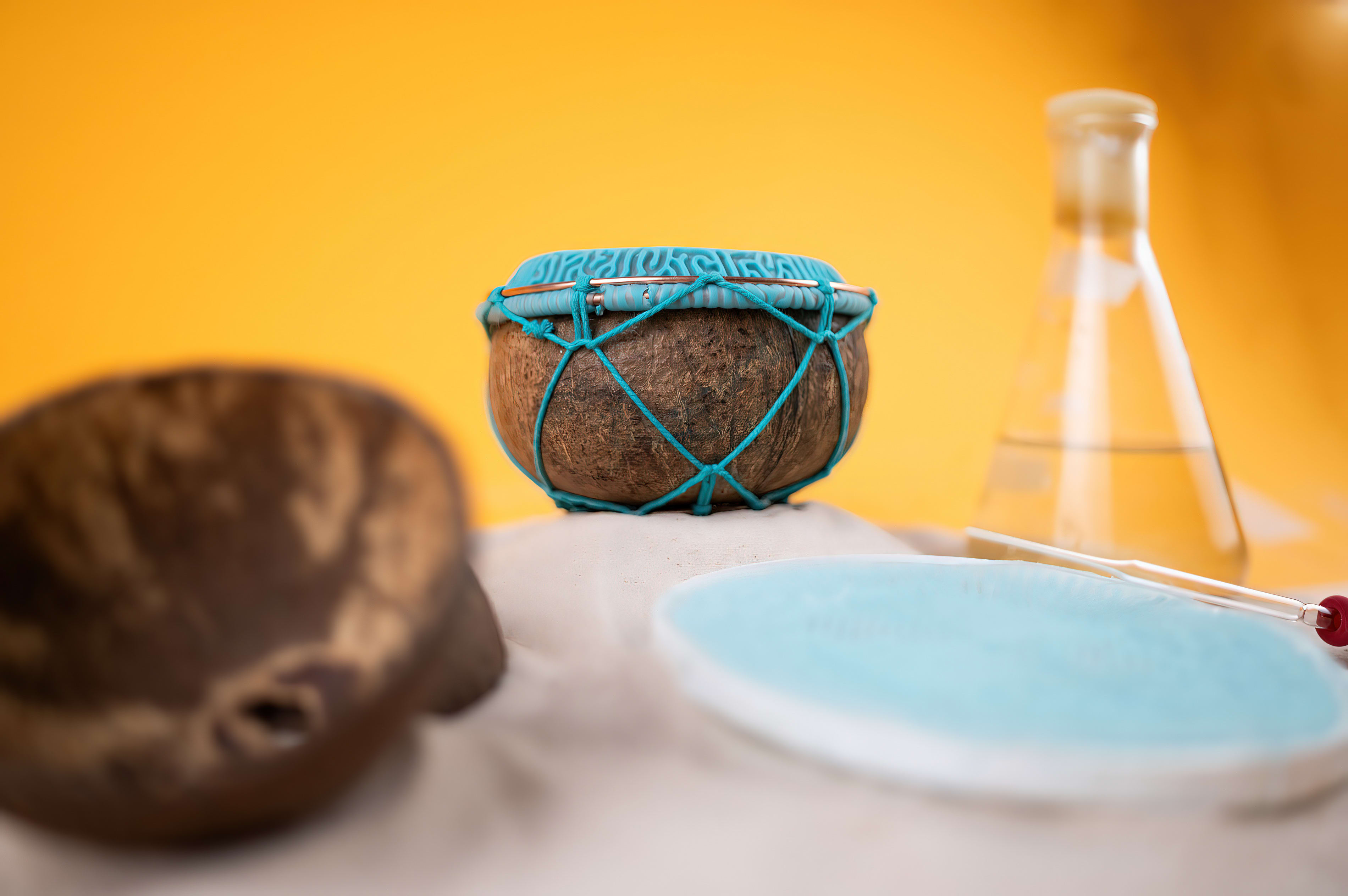 A small drum encased in a living bioluminescent material