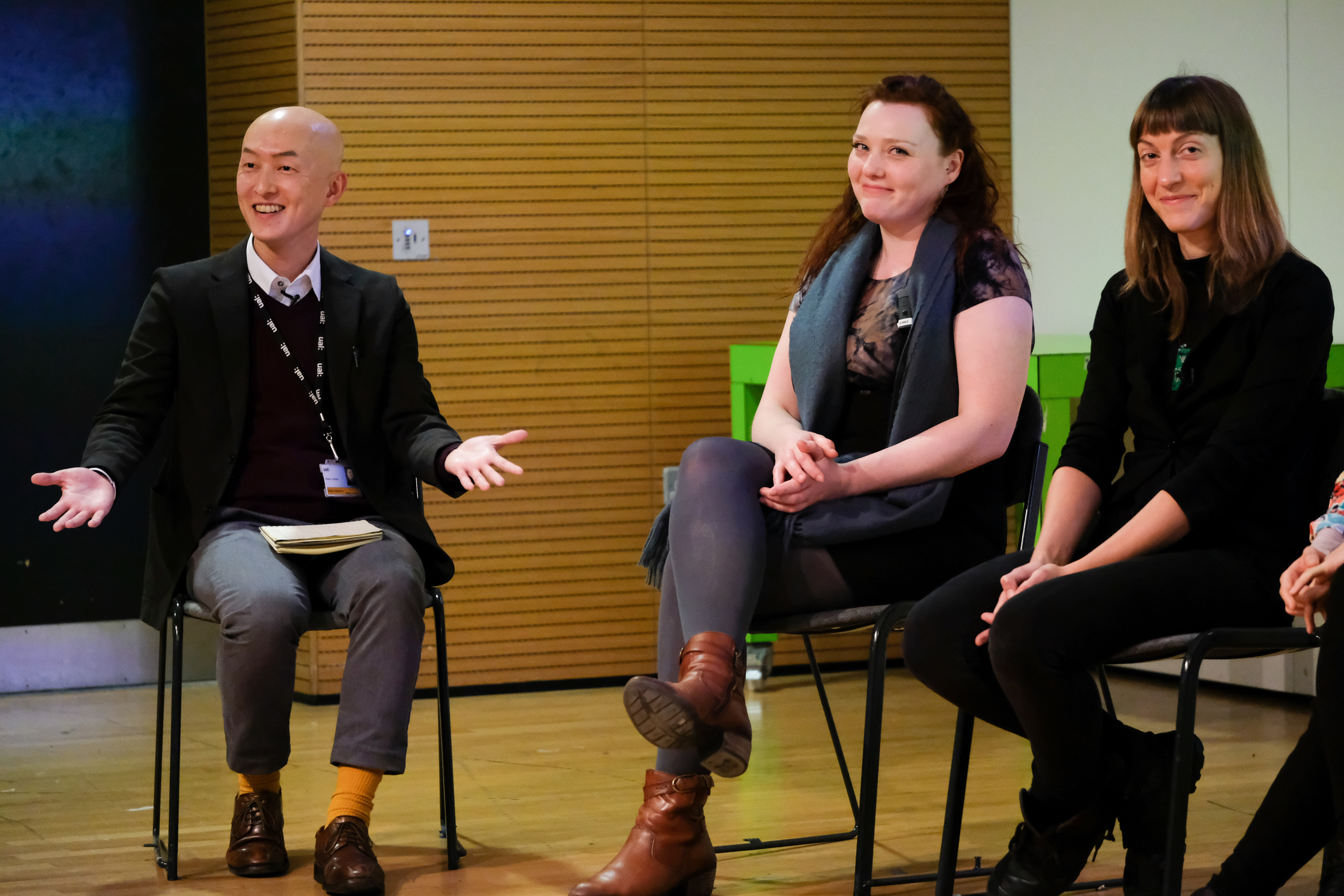 Smiling, seated people