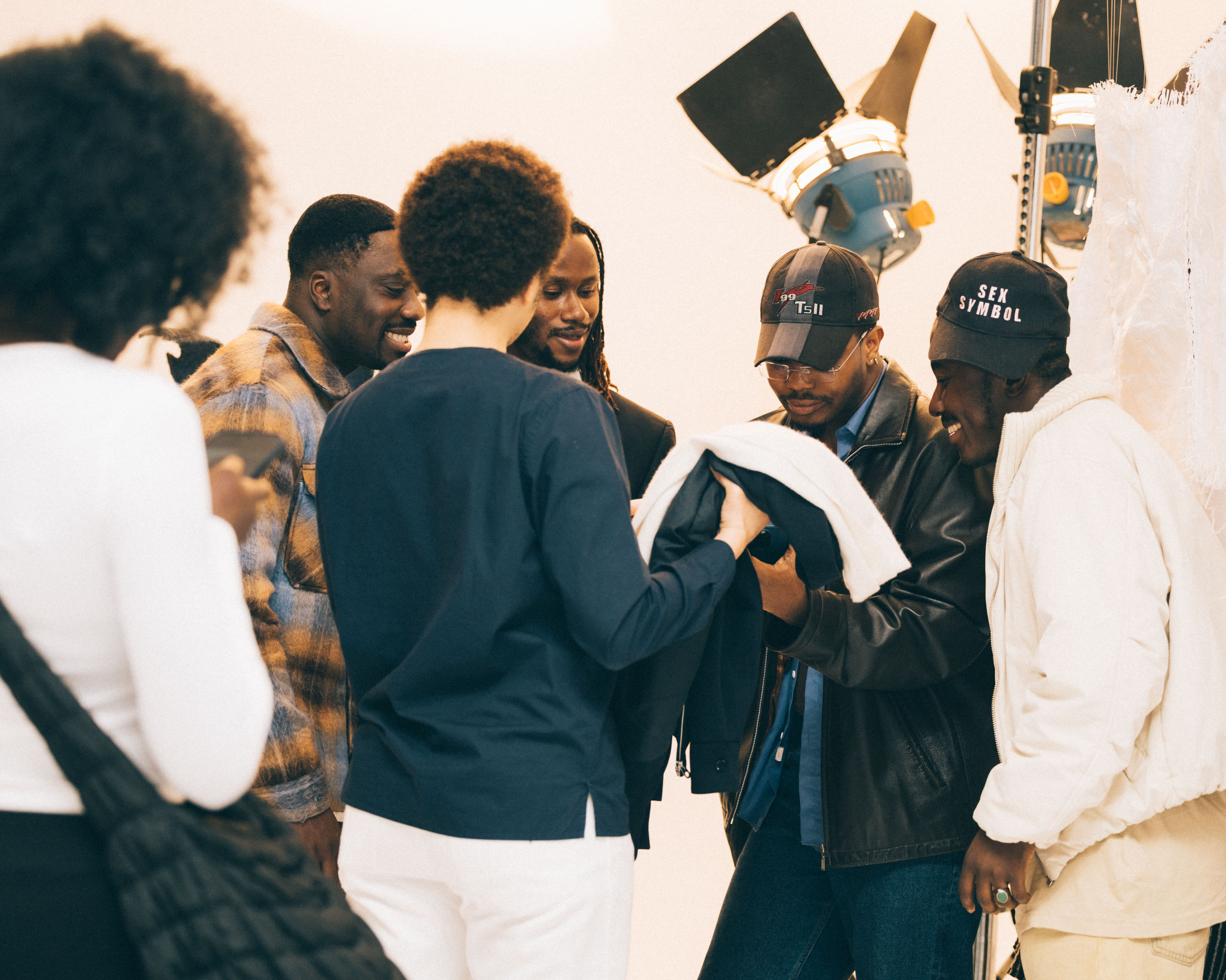 A group of people inspecting art