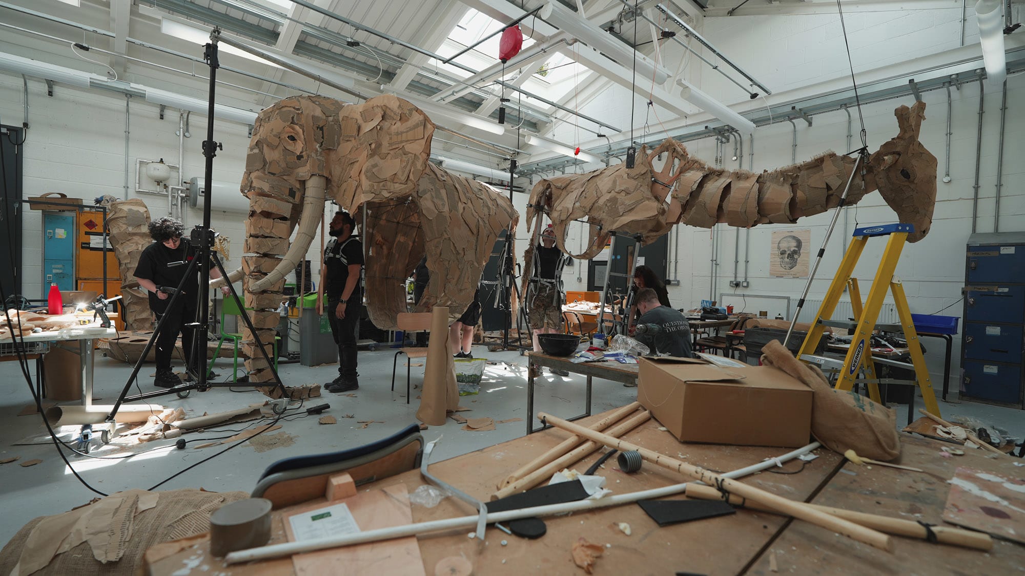 Giant elephant and giraffe puppets being constructed by students in the workshop at Wimbledon College of Arts as part of THE HERDS project.