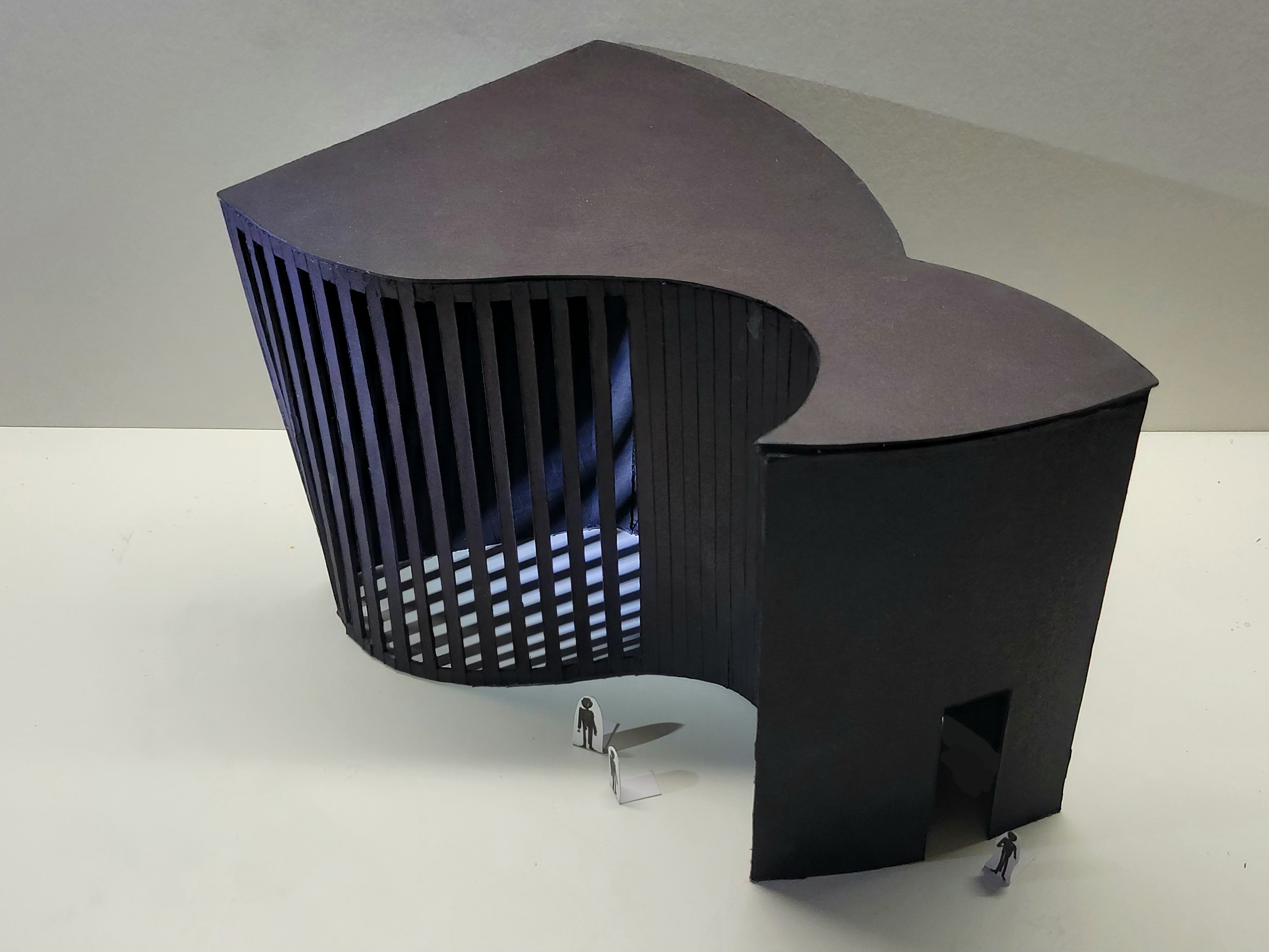 Black model of a house.