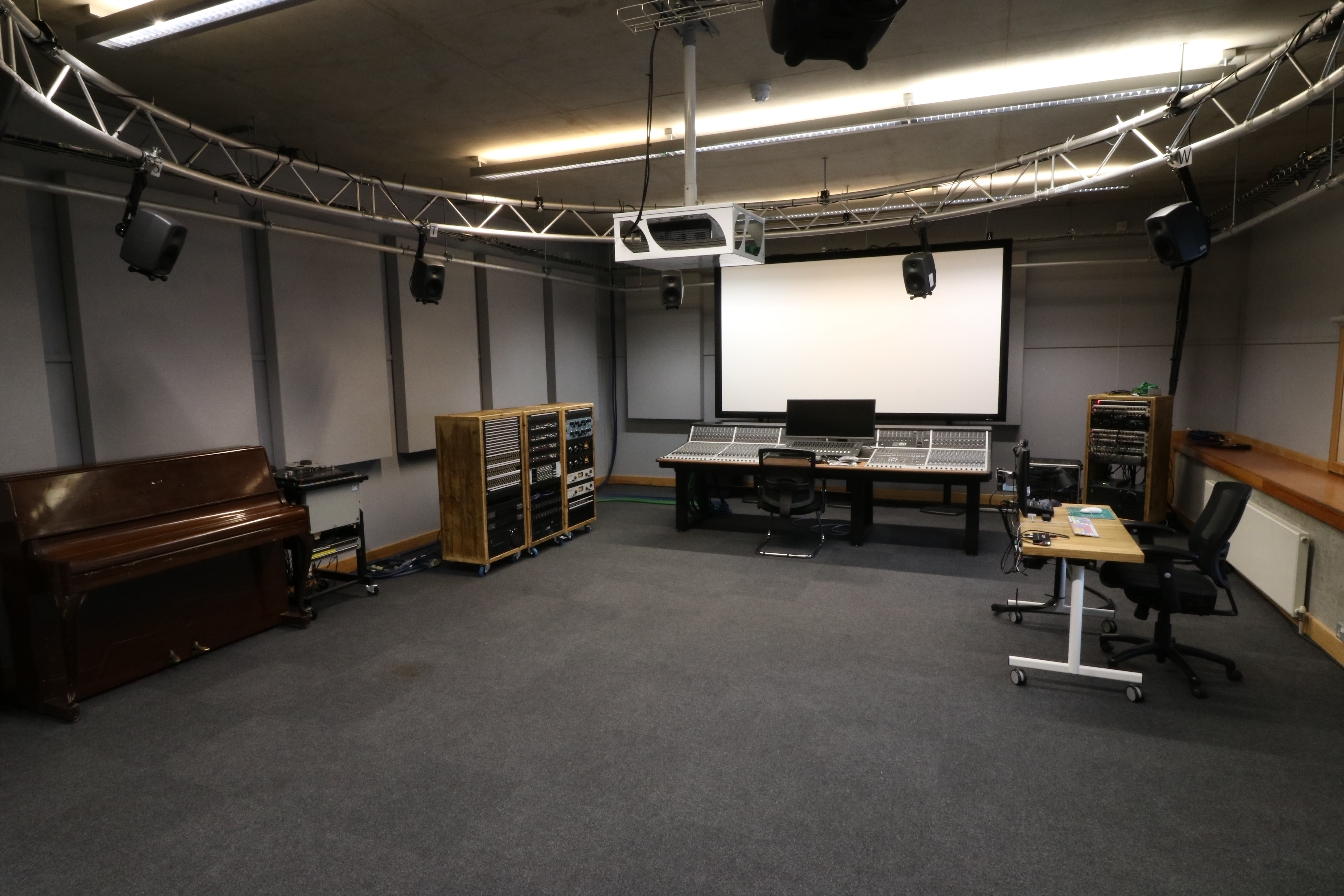 Photograph of a performance lab, showing sound arts equipment.