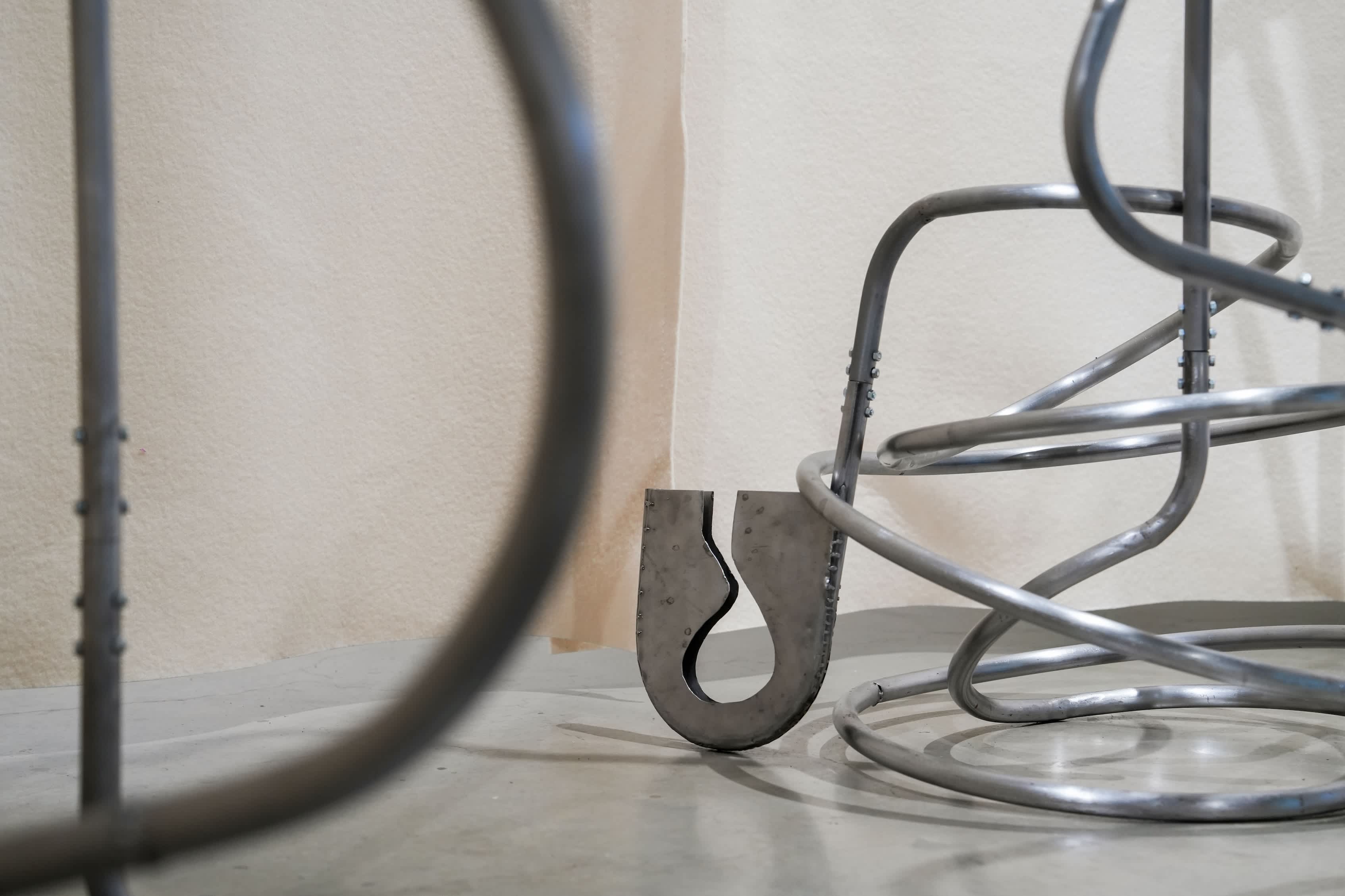 A supersized metal structure in the form of a distorted safety pin