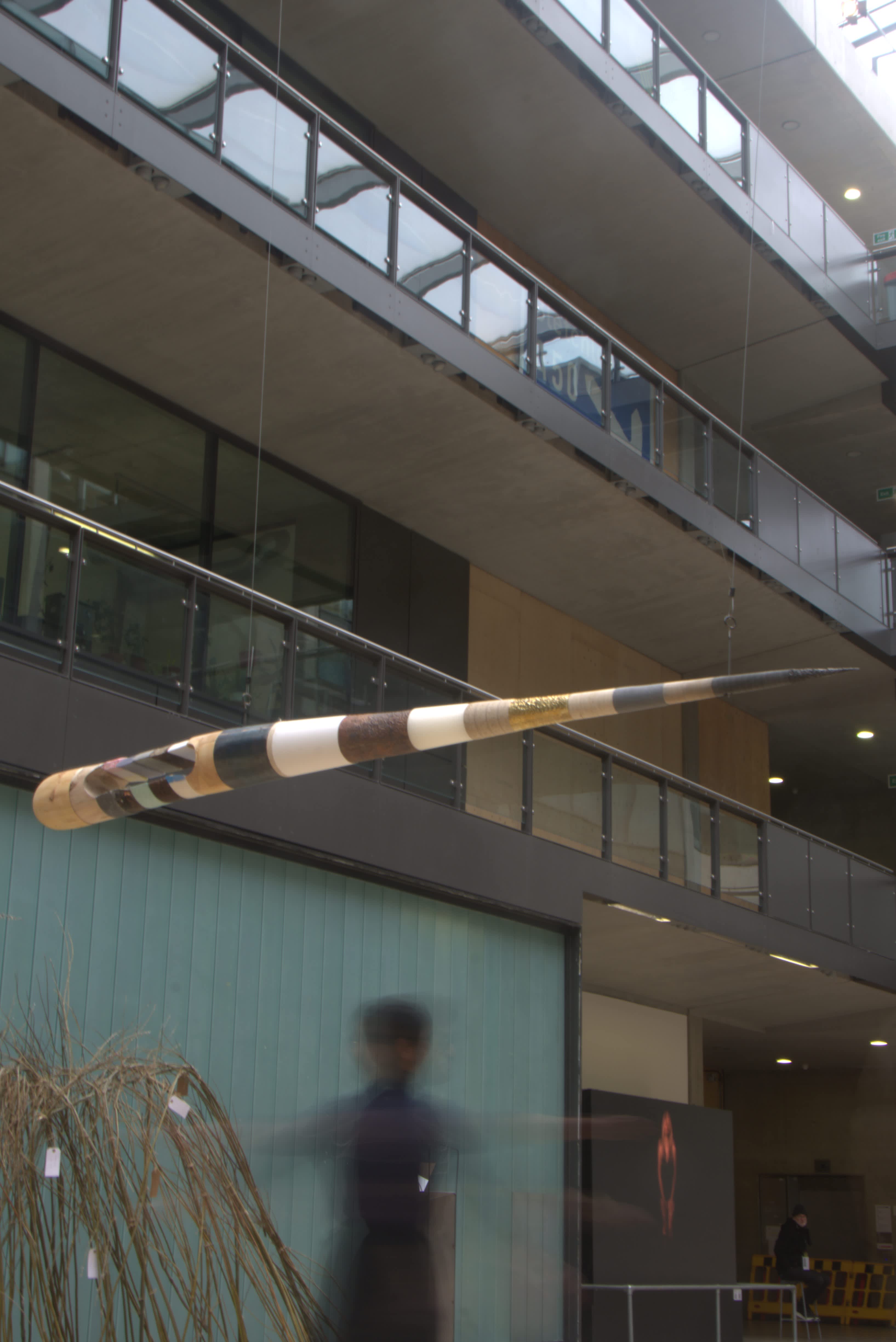 An image of an art peice hanging from the ceiling