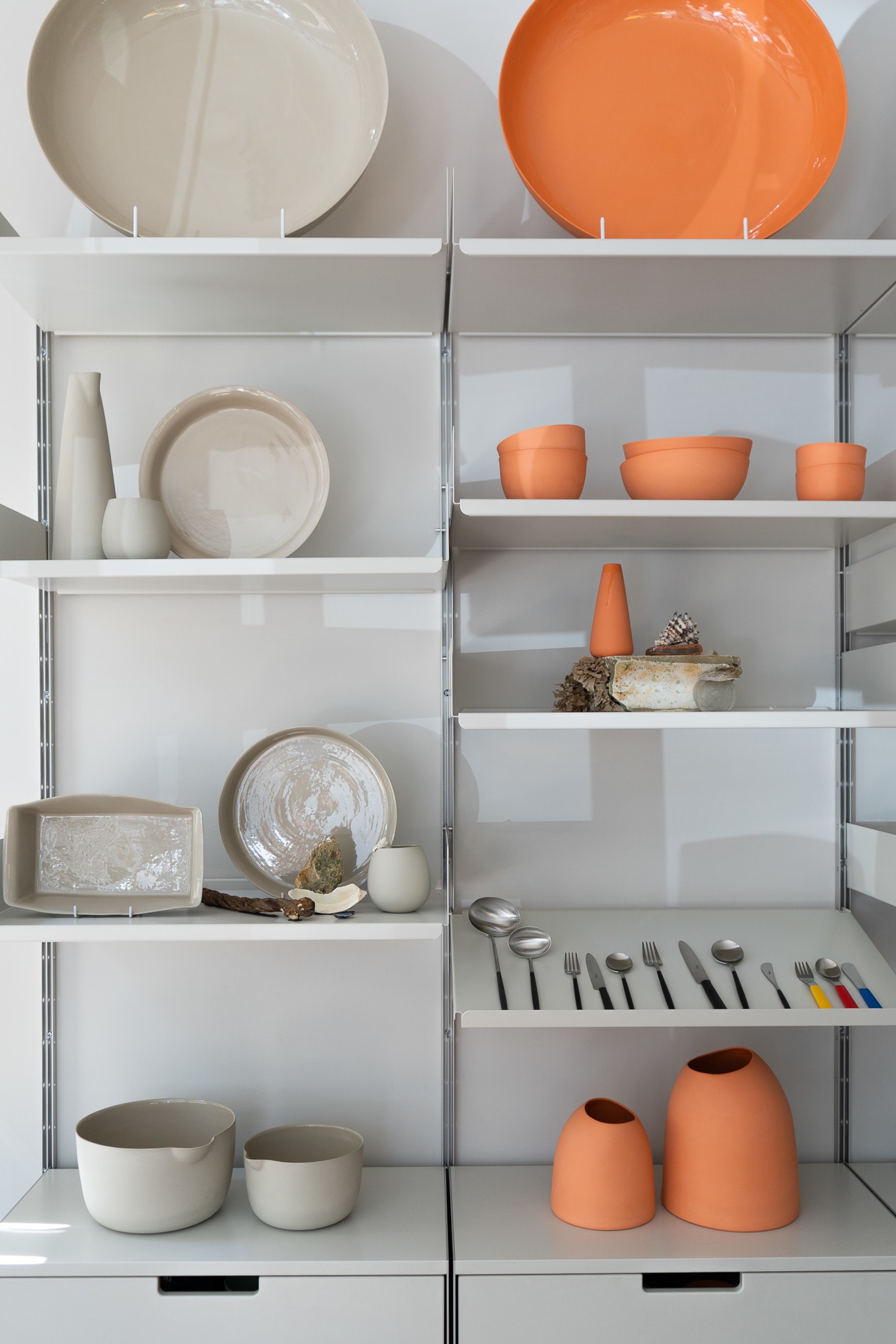 This is a photography of the orange ceramics from the LCC London Craft Week Mud Australia project