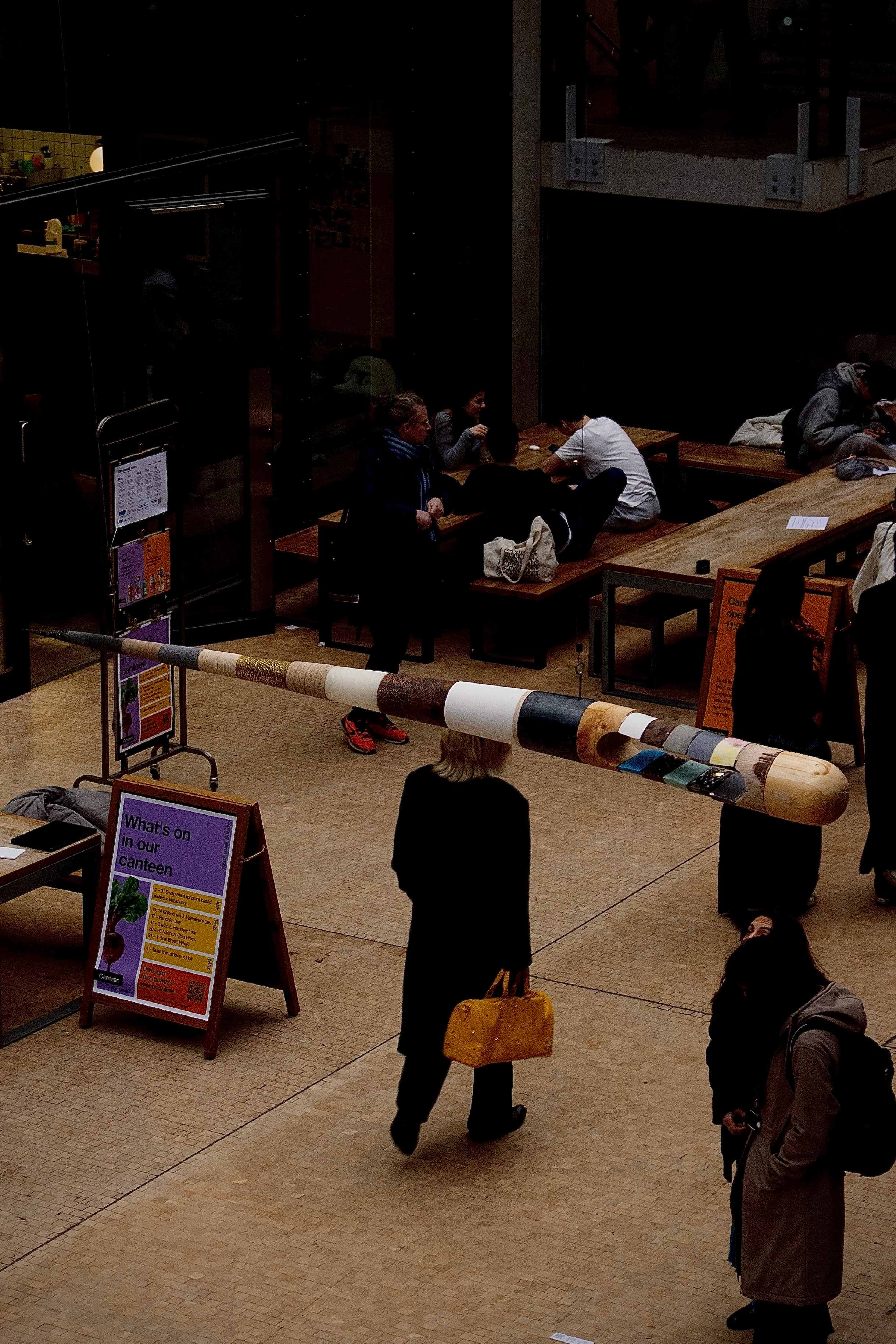 An image of an art piece hanging from the ceiling