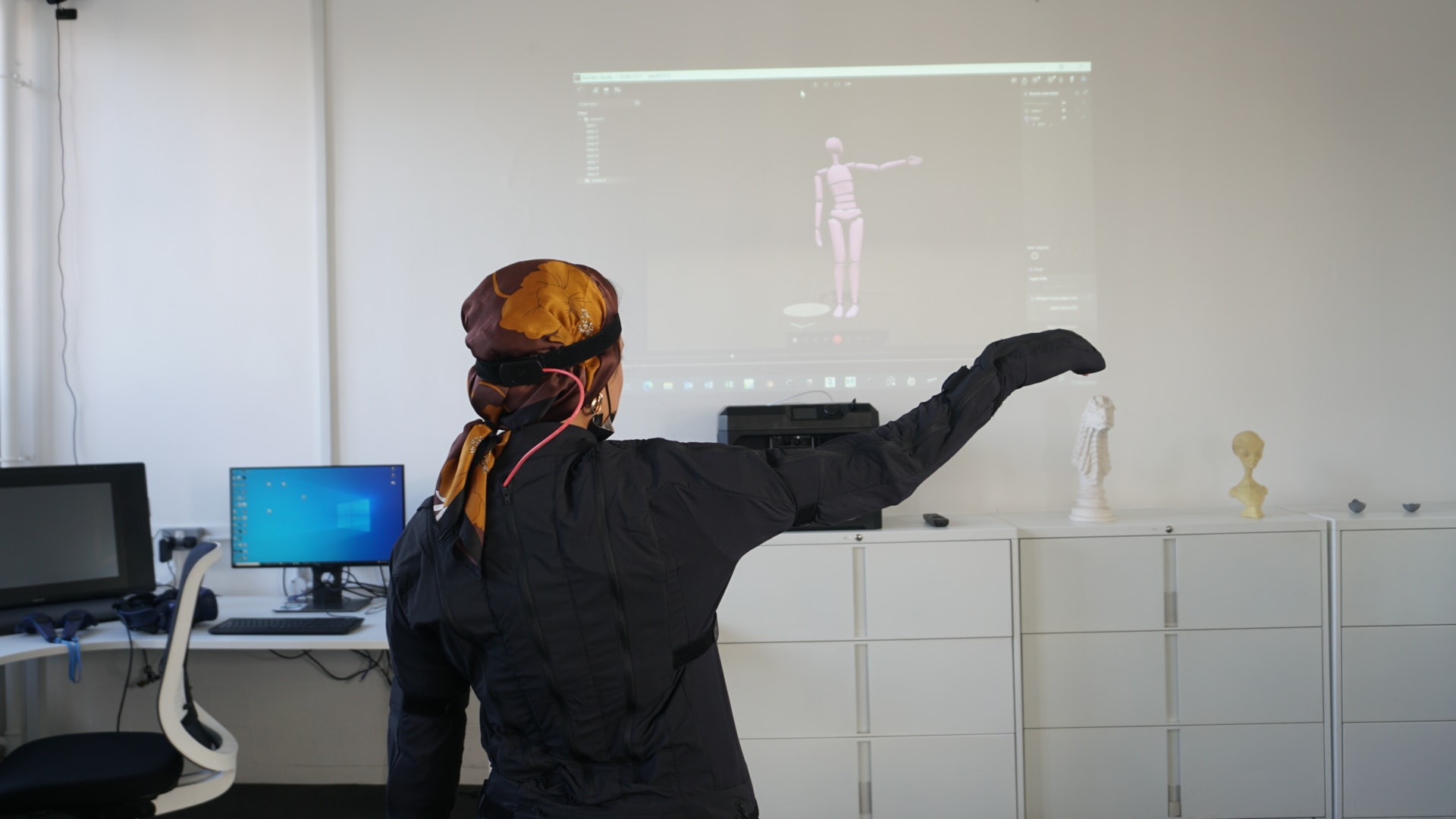 LCF-student-Syeda-Sumeya-Ahmed-using-a-motion-capture-suit-at-the-Digital-Learning-Lab,-Lime-Grove.-Photography-by-Neneh-Brathwaite,-LCF.JPG