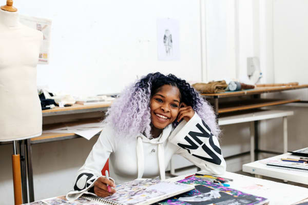 Student working on sketches in studio