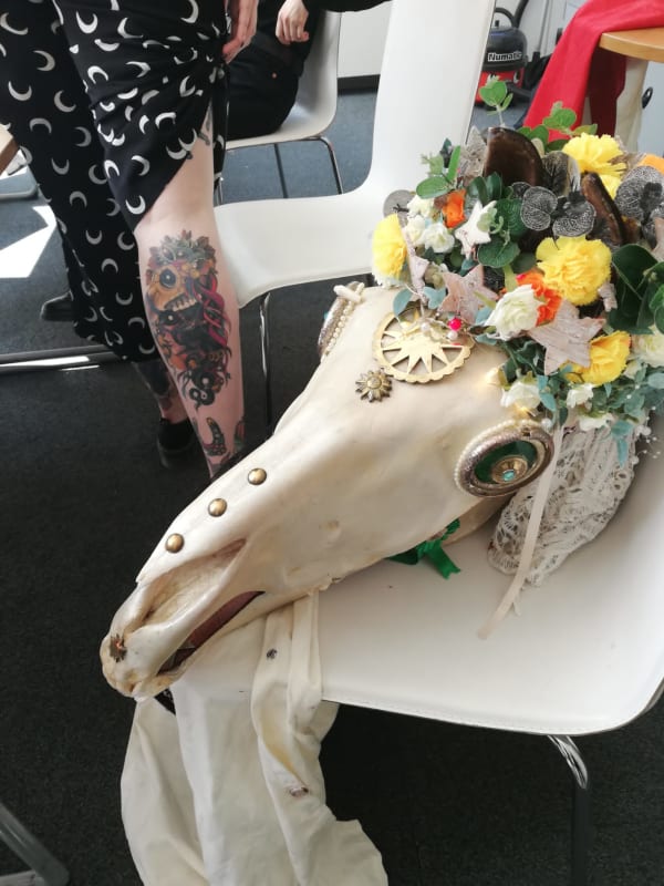 close up of 2 horse heads from the Mari Lwyds folk tradiiton