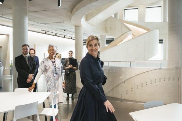 LCF Patron HRH Sophie, Duchess of Edinburgh smiling with people in the background