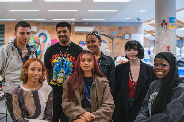 A group shot of 7 CSM Fashion Programme students