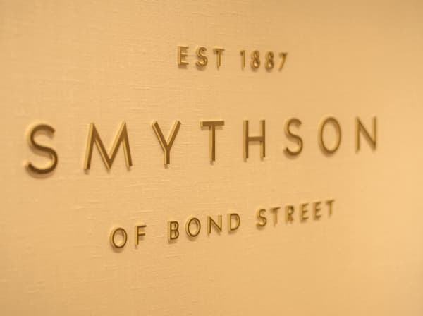 Smythson logo on wall