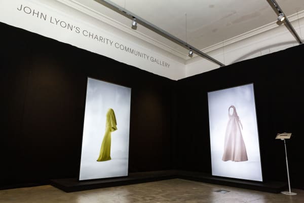 A photo of garments being displayed on digital screens as part of the Made in Code: Reimagining the Experience of Fashion installation