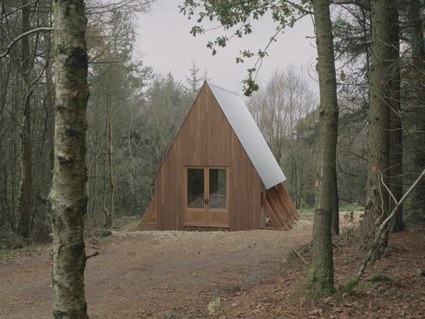 Wooden house in a forest.