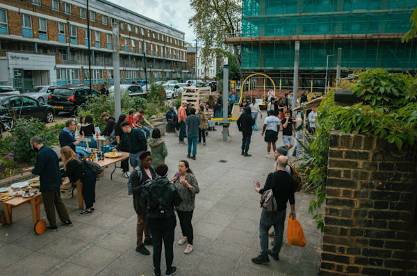 Members of the community gather in Stockwell Park