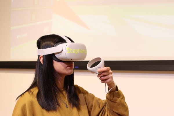 Person with VR headset in room
