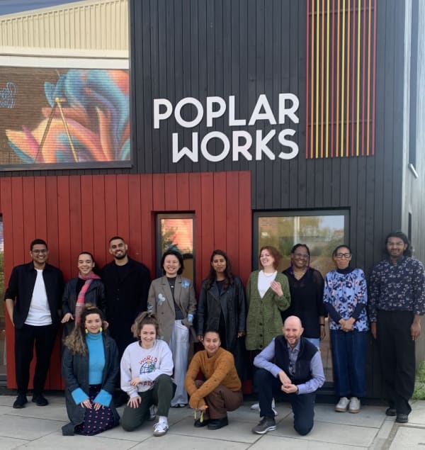 People standing outside studio space