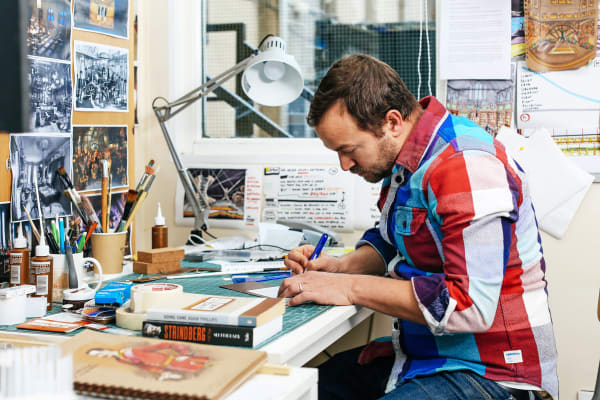 Yoav Segal working in his studio