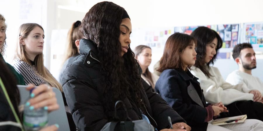 An audience of students attend one of the GBI industry events.
