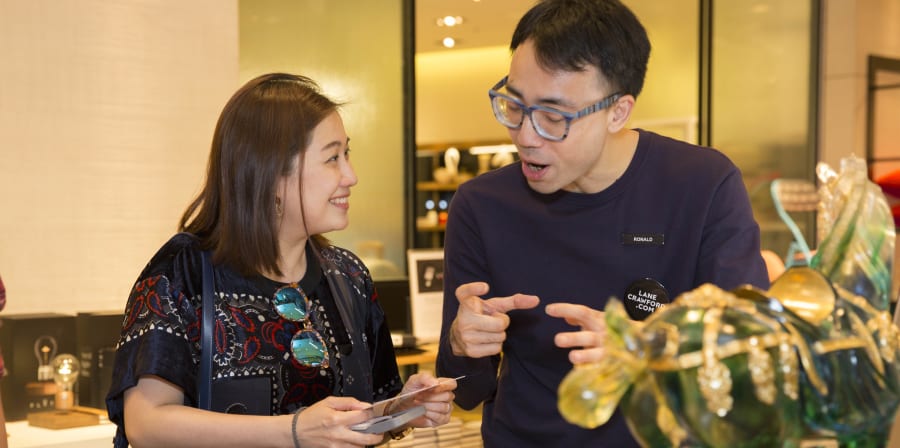 A woman and a man talking