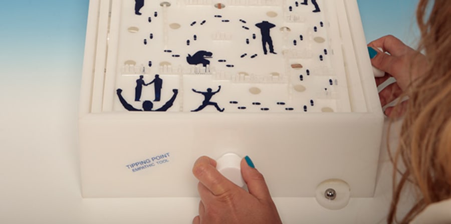 Overview of someone playing a marble game