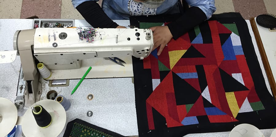 Woman working at a sewing machine