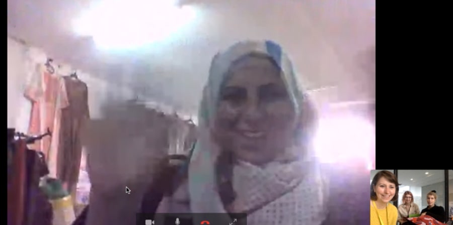 Screenshot of a woman on a Skype call